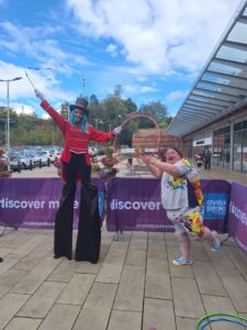 Ringmaster on stilts