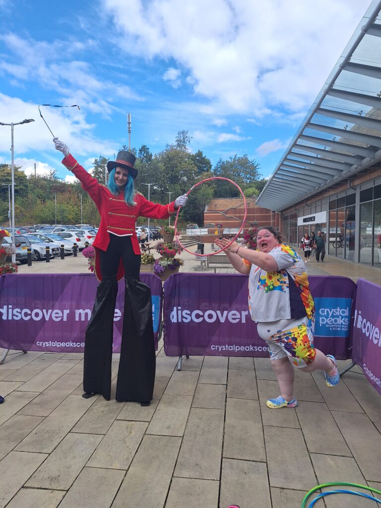 Ringmaster on stilts